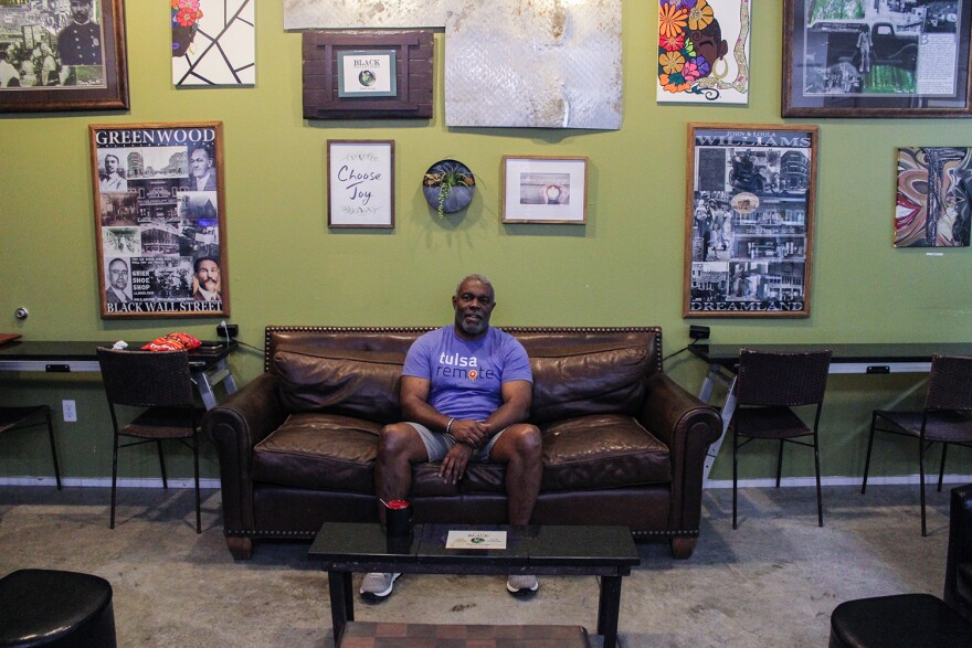 Dwight Eaton is co-owner of Black Wall Street Liquid Lounge, a coffee shop on Greenwood Avenue. Eaton opened the business with his partner, Guy Troupe, in January 2020.