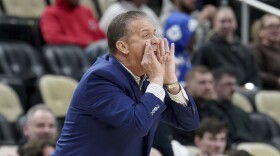Kentucky coach John Calipari calls out to the team during the first half of a college basketball game against Oakland in the first round of the men's NCAA Tournament Thursday, March 21, 2024, in Pittsburgh. (AP Photo/Matt Freed)