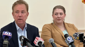 Marissa P. Gillett, the state’s chief utility regulator, watches Gov. Ned Lamont field questions about a new approach to regulation in April.