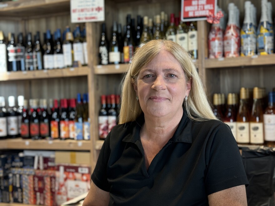 Madera native Jamie Hefner, who works in a tasting room inside a truck stop, has fond childhood memories of the trees.