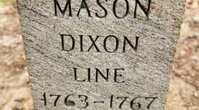 In this Friday, April 15, 2011, photo in Newark Del., shown is a post marking the base point in the survey of Charles Mason and Jeremiah Dixon. Mason and Dixon began their survey a century before the Civil War to settle a border dispute between Pennsylvania and Maryland.