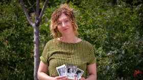 Salt Lake City-based artist Cara Despain holds photos of her mother Bonnie, Aug. 26, 2026. Bonnie Despain grew up in southern Utah 130 miles from the Nevada Test Site where 100 atmospheric nuclear tests were conducted in the years after WWII. She died in February of ALS, and a fragment of her bones was found to contain an abnormal amount of cesium, which can be formed in a nuclear reaction.