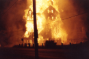 Silver King Coalition Mine Building on fire on July 20, 1981. Photo taken by Burnis Watts, who lived across the street from the Park Avenue building.
