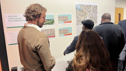 Community members gathered in the Historic West End on Tuesday to study ways to reconnect the low-income neighbourhoods to uptown after they was severed when the highway was built.