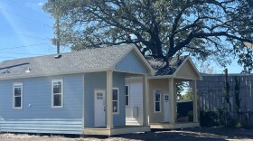 Trinity Village’s small cottages line the edge of Garden Street in Pensacola. The project aims to give vulnerable seniors a safe place to call home.