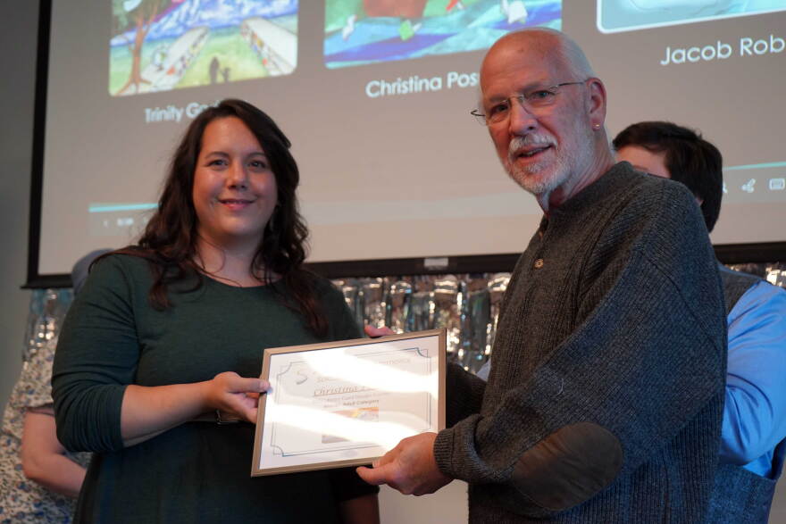 Christina Posma is recognized as adult winner of a contest to design new library cards at the Soldotna Public Library in Soldotna, Alaska, on Tuesday, Sept. 1, 2026.
