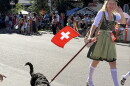 A Midway Swiss Days parade participant with a dog. The proposed application changes would allow event organizers to indicate whether they'd like to include animals in their town square festivities. 