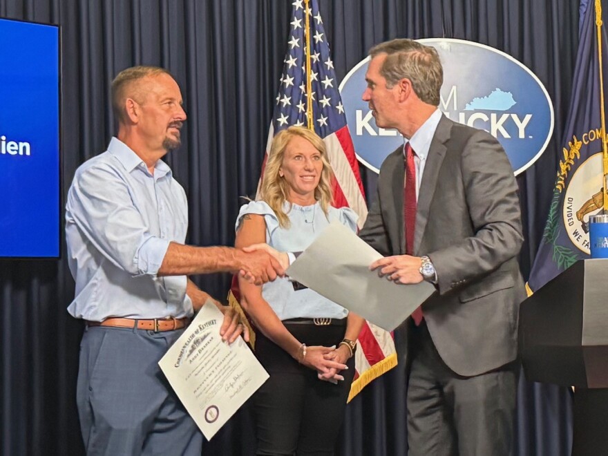 Jimmy Alexander and Jessica Alexander become Kentucky Colonels during Team Kentucky briefing.