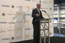 Indiana Governor Mike Braun at a podium for the groundbreaking of a Meta data center in Lebanon, Ind.