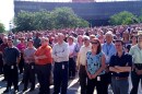 Burns-McDonnell employees learn of a thousand new-hire colleagues at company HQ in Kansas City.(Click to enlarge.)