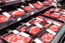 Showcase beef steaks meat products in a supermarket