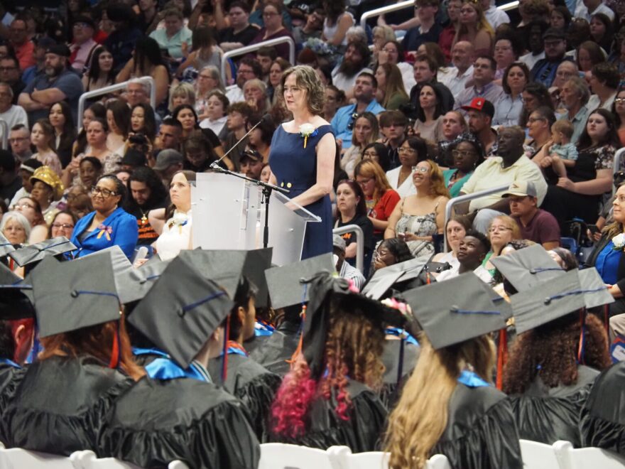 Elizabeth Sliger, executive director of Indiana Digital Learning School and Indiana Digital Alternative School, presides over a joint commencement ceremony in Indianapolis on May 28, 2026. An estimated 900 graduates were in attendance.