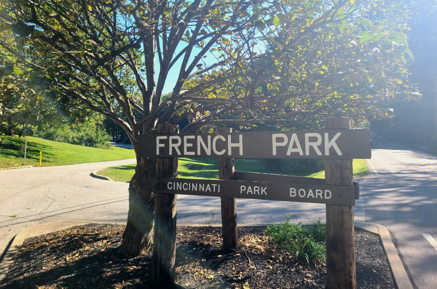 Park sign and tree. Sign says French Park