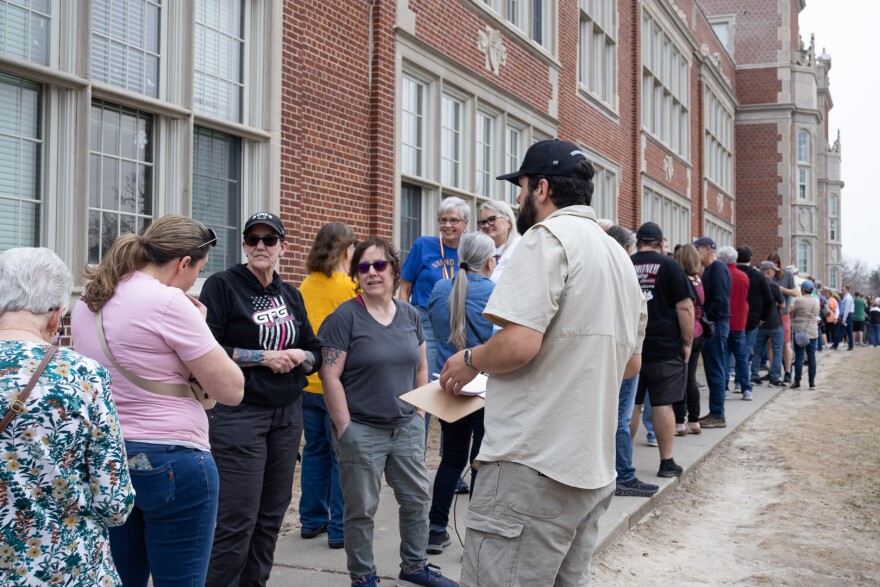 A line of people waited outside of Roosevelt High School in Des Moines on March 14 to hear Minnesota Gov. Tim Walz talk about the current state of the Democratic Party.