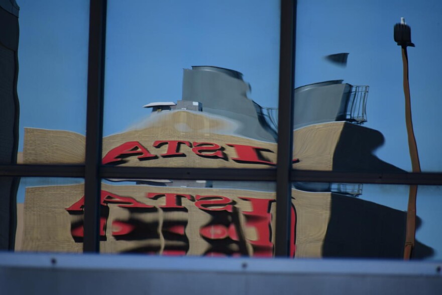 A reflection of the roof of the Indiana State Teachers Association.