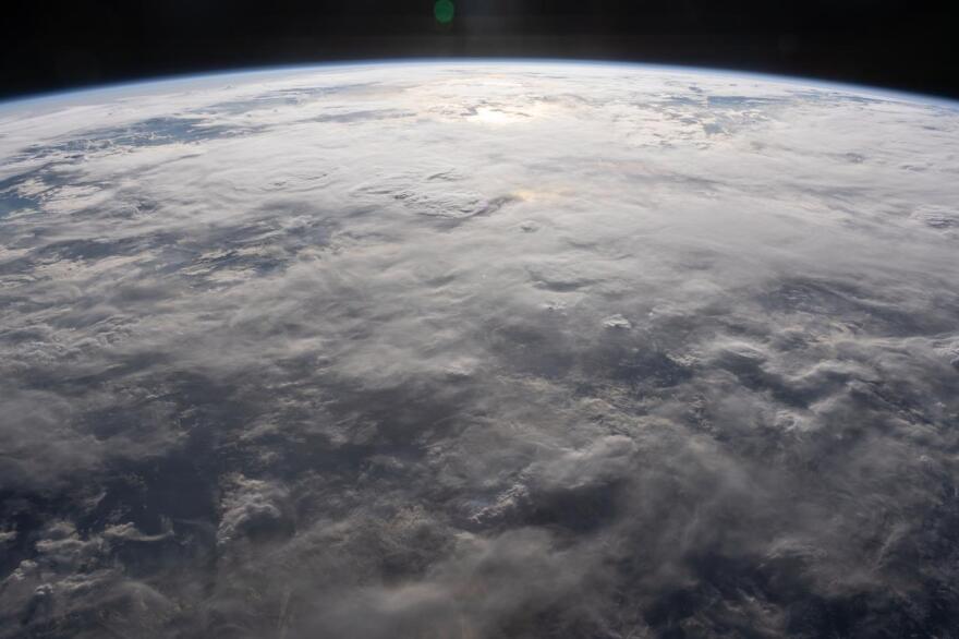 (Jan. 8, 2024) --- A cloud-covered Indian Ocean, illuminated about an hour before sunset, is pictured from the International Space Station as it orbited 260 miles above just off the northeast coast of the island nation of Madagascar.