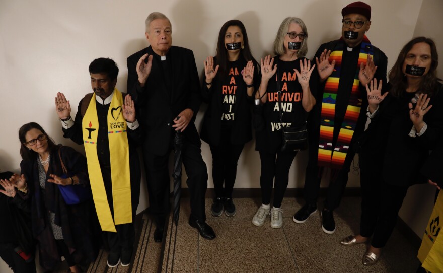 Protesters in the Dirksen Building, not permitted on the floor of the hearing, lined the stairwells instead.