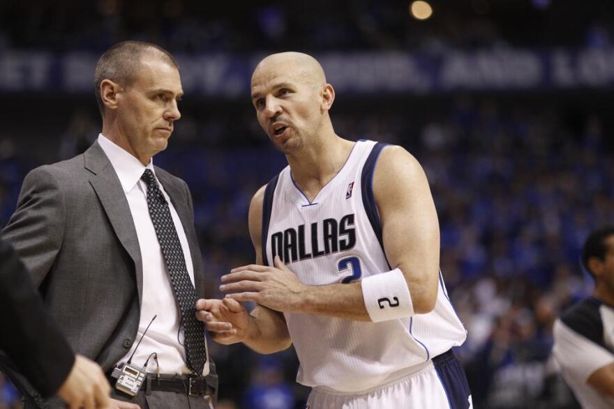 Dallas Mavericks' Rick Carlisle and Jason Kidd talk during Game 1 of the NBA basketball Western Conference finals against the Oklahoma City Thunder in 2011. Kidd is coming back to Dallas again, this time to replace the coach he won a championship with as the point guard of the Mavericks 10 years ago. 