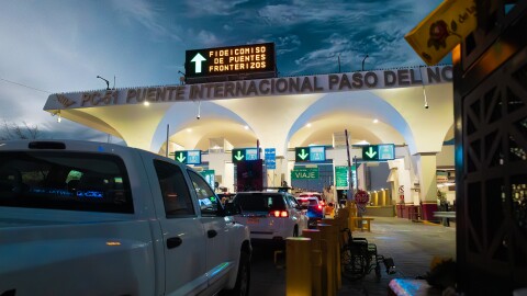 Vehicles wait in line at the Santa Fe International bridge to cross from Ciudad Juarez into El Paso.