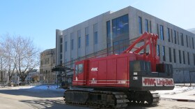A crane has been moved to 2nd Avenue's 1300 block near the 122-year-old courthouse. 