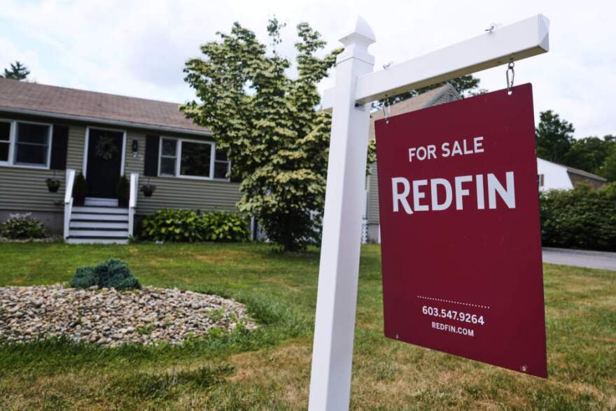 A for sale sign, from the Redfin brokerage, is displayed in front of a single family home, Thursday, July 17, 2025, in Derry, New Hampshire. (Charles Krupa/AP)