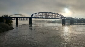 Fog rolls in over the Ohio River near the Purple People Bridge.