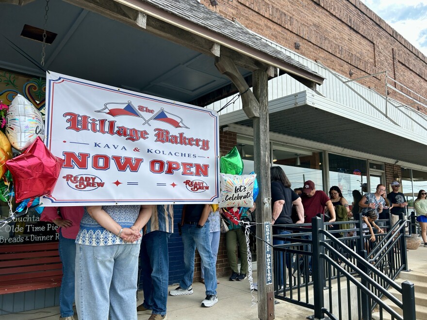 Customers wait in line outside Village Bakery in West, Texas, during their grand reopening on Saturday, May 23, 2026. The bakery served over a hundred customers on opening day.