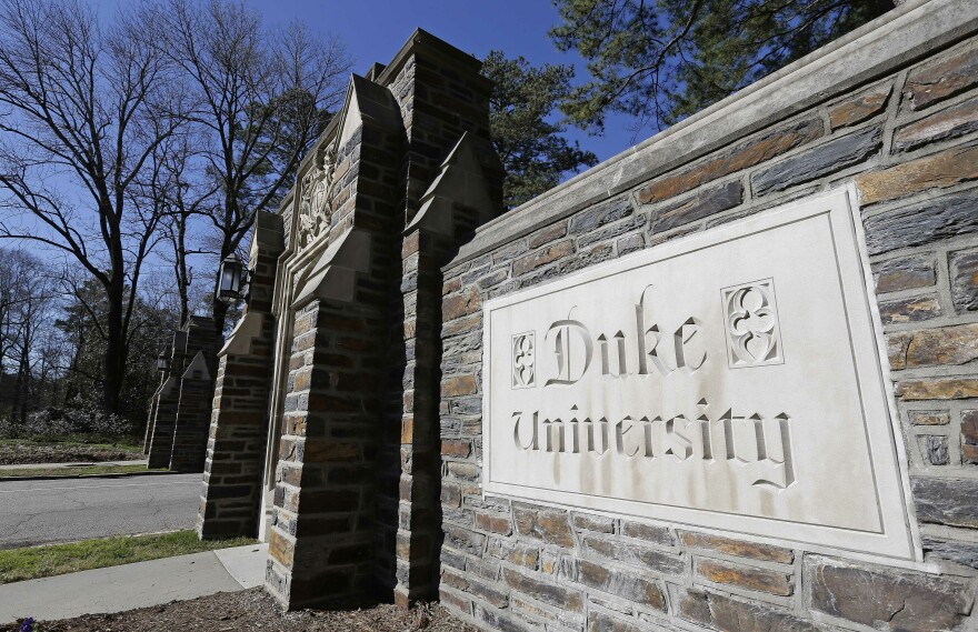 FILE - This Jan. 28, 2019 file photo shows the entrance to the main Duke University campus in Durham, N.C.