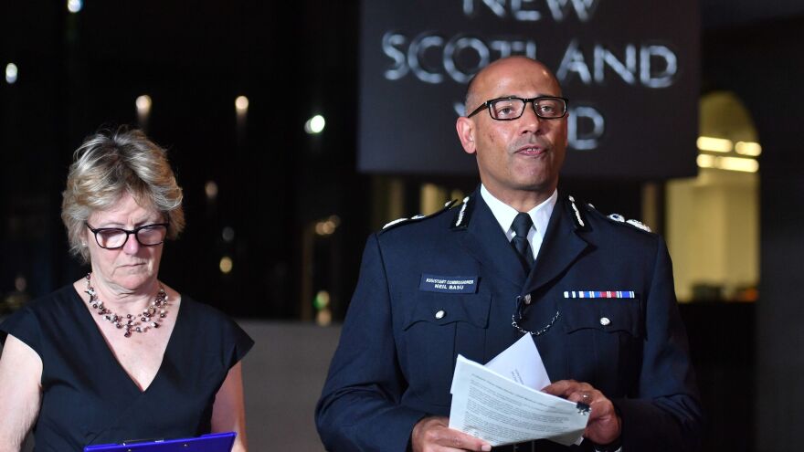 The U.K.'s head of Counter Terrorism Policing Neil Basu (right) and the chief medical officer for England Dame Sally Davies, speak at a news conference at New Scotland Yard in London on Wednesday. British police say a couple who are critically ill were exposed to the Russian nerve agent Novichok.