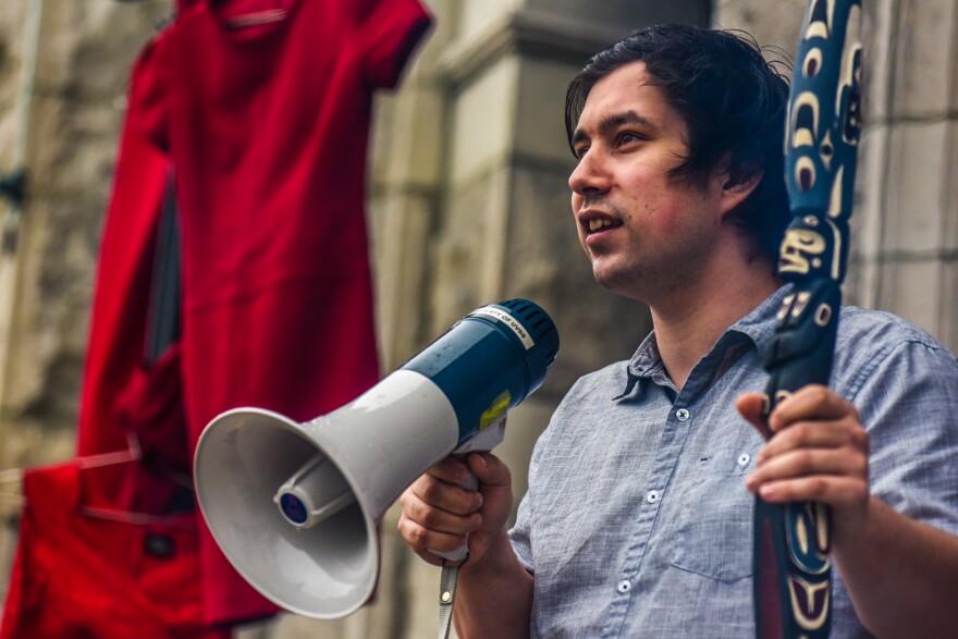 Mike McKenzie, a member of the Secwepemc Nation, leads a protest outside the British Columbia Legislative Assembly where Indigenous youths ceremonially occupied the front steps of the building, in solidarity with Wet'suwet'en people fighting the Coastal GasLink pipeline. The gas pipeline gets robust support from the provincial government, even as that same government fights hard against a second pipeline being pushed by the federal government to deliver heavy oil from the Alberta tar sands to the Vancouver area, where it would be shipped to Asian markets. McKenzie has been unable to live in his home of the Secwepemc Nation due to his outspoken opposition to both projects.