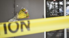 Caution tape and flowers cover the entrance to the Beth Israel Congregation, a synagogue that was set on fire early Saturday morning, on Monday, Jan. 12, 2026, in Jackson, Miss. 