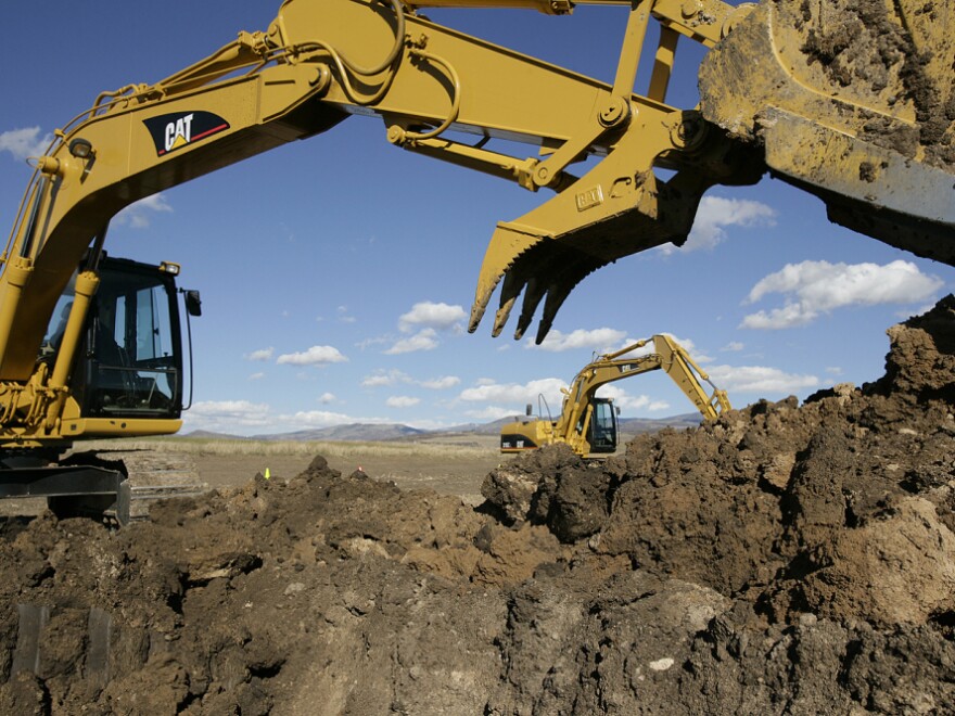 A Caterpillar Excavator at Dig This, a playground for adults that allows them to drive and operate construction equipment.