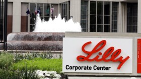 FILE- In this April 26, 2017, file photo shows the Eli Lilly and Co. corporate headquarters in Indianapolis. Shares of Eli Lilly and Co. jumped early Thursday, June 24, 2021, after the drugmaker said it will seek approval for its potential Alzheimer’s treatment later this year.