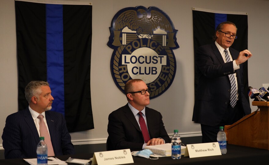 Attorney Michael Schiano, who is among those representing the seven Rochester Police officers who were suspended in the Daniel Prude case, talks to the media Thursday at the Locust Club police union headquarters.