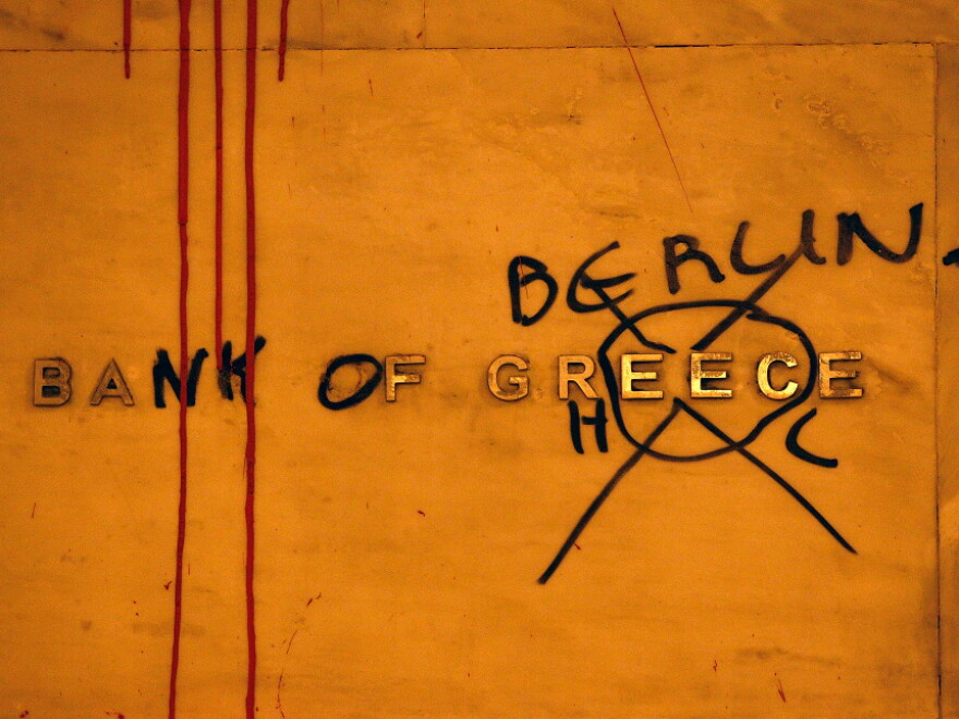 Protesters have "renamed" the Bank of Greece in honor of Germany, which many Greeks see as having undue influence over economic decisions in their country. The sign is seen in Syntagma Square on Feb. 12, 2012 in Athens, Greece.