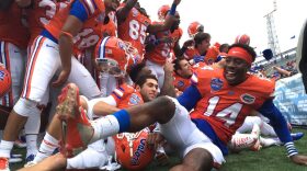 Florida players celebrate in front of the band after their victory.