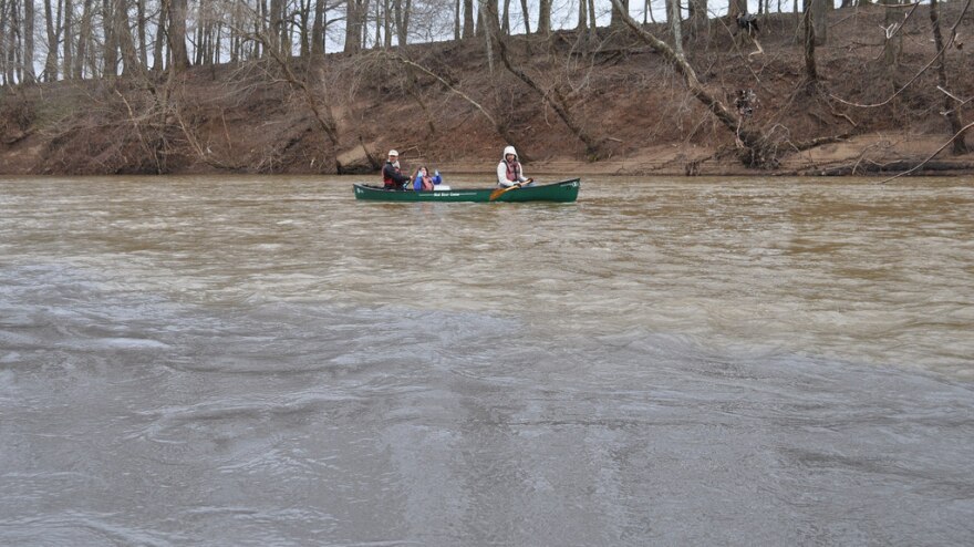 Volunteers with the Dan River Basin Association, graduate students from Duke University and staff with the environmental group Appalachian Voices collect water samples on the Dan River after a massive coal ash spill.