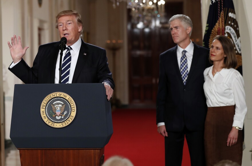 President Donald Trump speaks in the East Room of the White House in Washington, Tuesday, Jan. 31, 2017, to announce Judge Neil Gorsuch as his nominee for the Supreme Court. Gorsuch stands with his wife Louise.