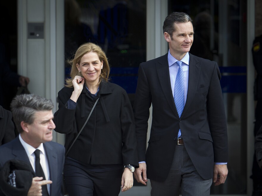 Spain's Princess Cristina (left) and her husband, former Olympic handball player Inaki Urdangarin (right) leave the courtroom in Mallorca on Feb. 9. Cristina, the Spanish king's sister, is accused of doing fraudulent business deals on the island. Urdangarin faces charges of embezzlement and money-laundering.