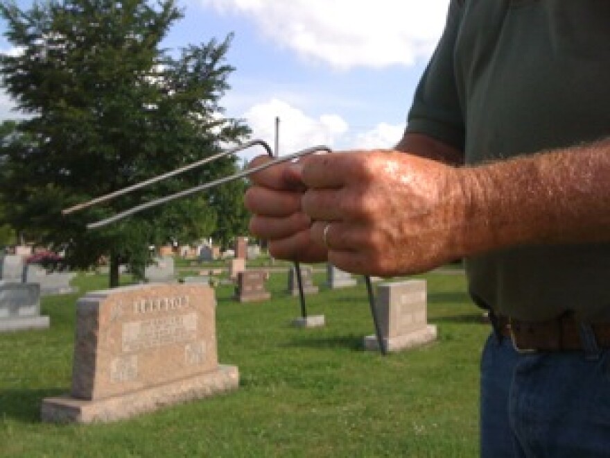 A water witch can use different tools for dowsing; some use branches or twigs while other prefer wires.