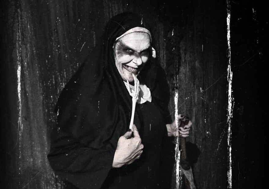 Meet many frightening characters like this nun up close (if you dare) at Medford's Nightmare Chamber Haunted House.