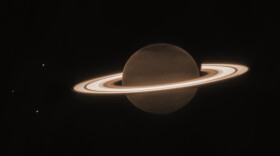 This June 2023 image provided by the Space Telescope Science Institute shows the planet Saturn and three of its moons, from left, Enceladus, Tethys and Dione, captured by the James Webb Space Telescope.