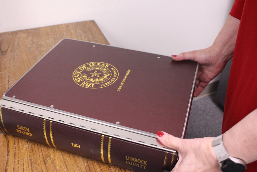 Kelly Pinion handling birth records at the Lubbock County Courthouse in Lubbock, Texas, on Thursday, Oct. 15, 2026.
