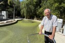 Army veteran John Bohanek stands next to what once was his swimming pool before Hurricane Ian destroyed his home.