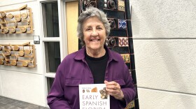 Dr. Judy Bense with her latest book, "Early Spanish Florida."
