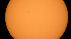 In this handout provided by NASA, the planet Mercury is seen in silhouette, lower left, as it transits across the face of the sun Monday, May 9, 2016 Boyertown, Pennsylvania.  Mercury passes between Earth and the sun only about 13 times a century, with the previous transit taking place in 2006.  (Photo by NASA/Bill Ingalls via Getty Images)