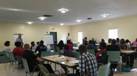 Residents in Duval Heights meet with Gainesville police officers to discuss issues in their community.