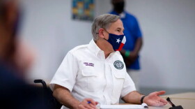 Gov. Greg Abbott meets with local leaders in El Paso to discuss the coronavirus situation in the city and state on Aug. 13, 2020. 