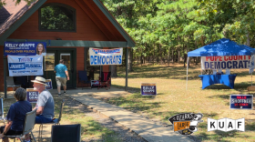 Signs promote Democratic candidates on the November ballot outside a cabin at Mount Nebo State Park during the park’s annual chicken fry on Aug. 29, 2026.