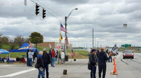 UAW members picket outside the GM Fort Wayne Assembly plant Thursday as they wait for word from the UAW National GM Council meeting in Detroit.